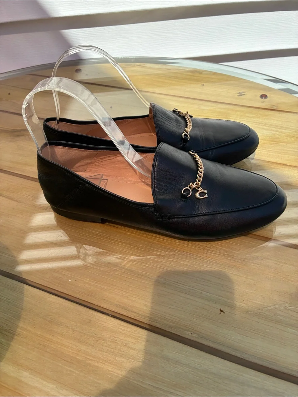 Coach Black Leather Loafers with Gold Chain Accent